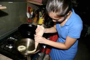 my niece making the churros